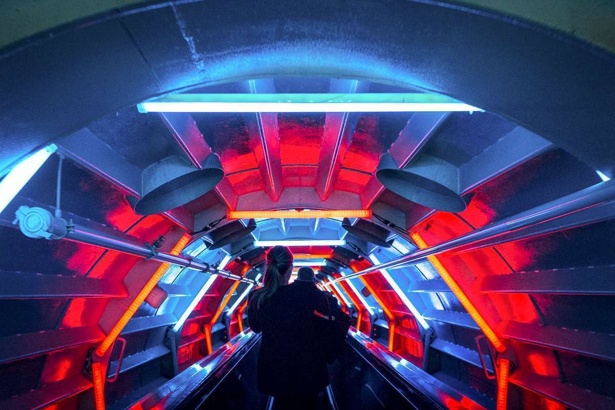 The exit escalator at the Atomium in Brussels comes with a futuristic sound and light show