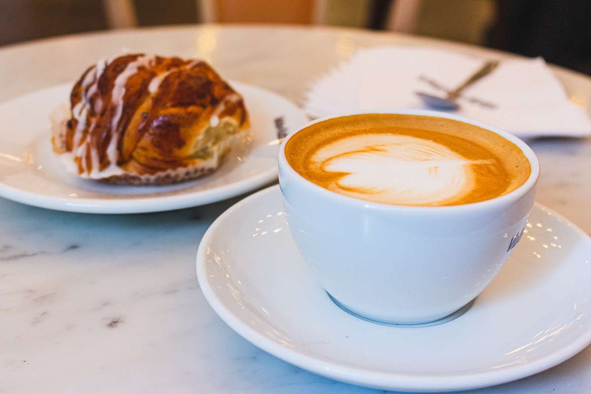 Fika time, with coffee and a cinnamon bun, is one of one of the very unique things to see and do in Stockholm